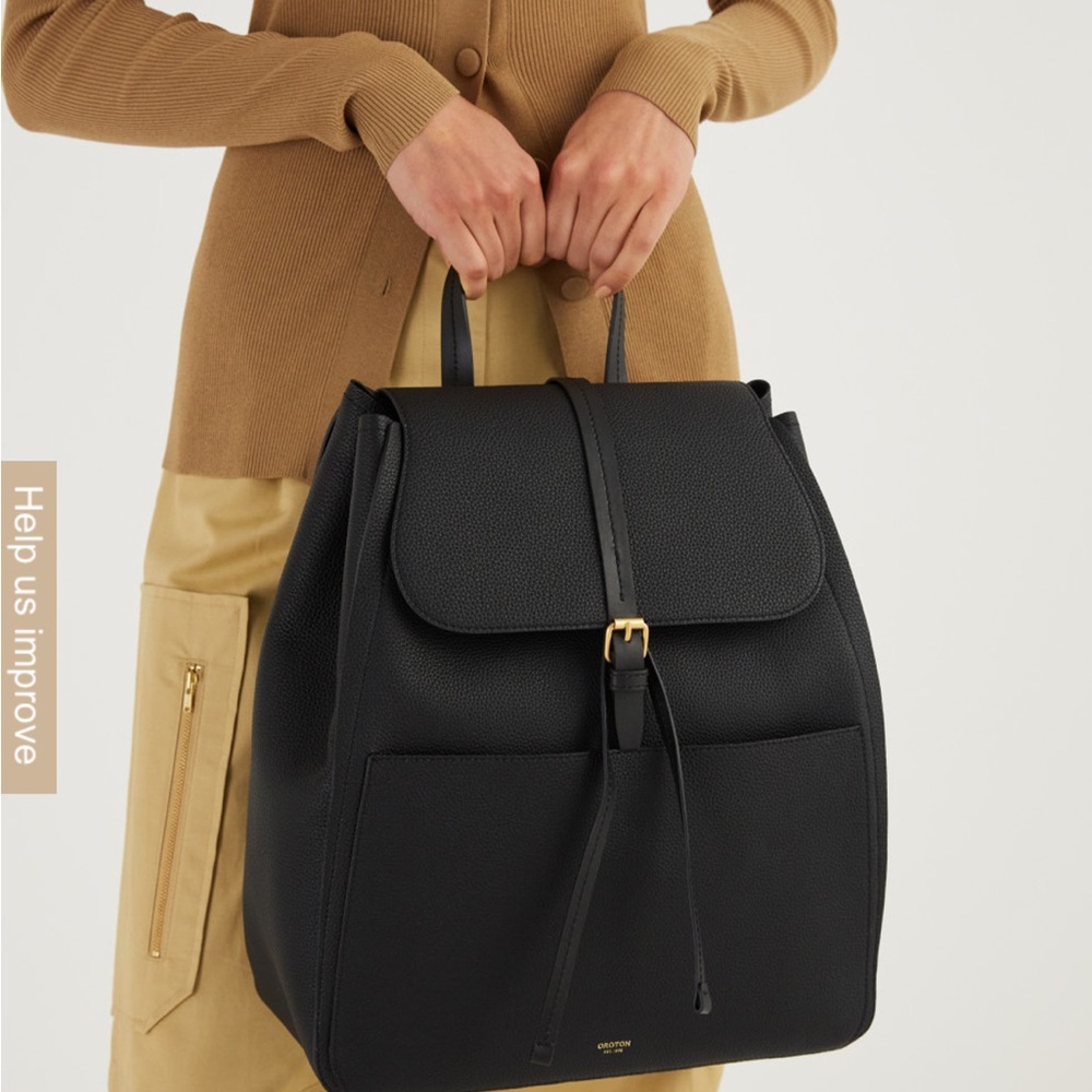 Oroton Black Backpack with Gold Hardware and Structured Design- Used Once.